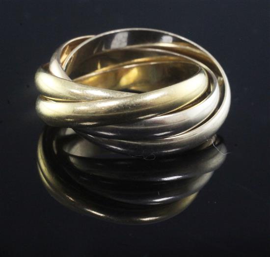 A Les Must de Cartier 18ct three colour gold Trinity quintuple hoop ring, size K.